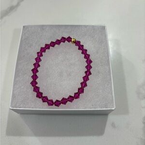 Embrace the Radiance of the Preciosa Fuchsia Crystal Bracelet!